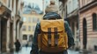 © Bopha - A traveler wearing a stylish backpack in a new city