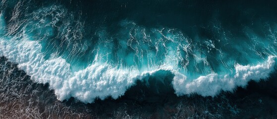 Poster - Aerial View of Ocean Wave Crashing on Shoreline in Teal Blue Water; Dramatic Coastal Landscape Scene; Nature Beauty; Seascape Photography; Tropical Paradise Destination