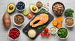 © Stfane - Healthy Balanced Diet with Salmon, Vegetables, Whole Grains, and Fresh Fruits on a Light Wooden Background