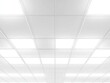 © EpicFade - Looking Up at a Grid of Fluorescent Lights in a Modern Office Building Interior from a Low Angle Perspective