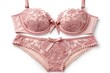© JALALi - A pink floral bra and panty lingerie set is displayed beautifully against a white background