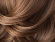 © HooSv - A close-up shot of flowing, wavy brown hair with subtle blonde highlights, showcasing texture and shine.