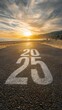 © Best Wishes Art - Sunset over sandy beach with painted numbers indicating the year 2025 on the road