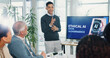 © peopleimages.com - Man, presentation and screen with meeting for AI ethics, smile and planning for future web development at office. Person, speaker and staff in boardroom with data governance at startup tech agency