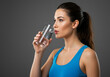 © J.G Studio - Woman drinking water hydration health wellness