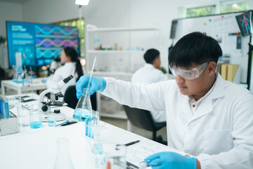 Wall Mural - medical science and technology professionals working in a laboratory research environment where scie