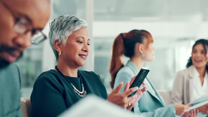 Poster - Mature woman, phone and texting at meeting for contact, notification and agenda at finance agency. Person, smartphone and scroll with mobile app, smile and deal with staff in boardroom at company