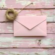 © Shehroo Time - Pink Wooden Surface with Kraft Envelope and Twine