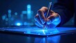 © Igor_Tichonow - A futuristic hand interacts with a glowing digital tablet interface in a dark high-tech environment