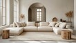 © HERMAWAN - Cream sectional sofa in a light, airy living room
