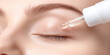 © Grigoriy - Closed eye with a dropper applying serum on the eyelid. Skincare, beauty routine