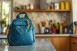 © Sandu - Backpack on Kitchen Counter