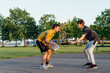 © okrasiuk - Two Young Caucasian male teenagers Playing Basketball at Park outdoor playground in sunset light. Teenagers' hobby, offline activity. Concept of sports, hobbies and healthy lifestyle. Selective focus.
