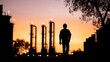 © BOJOShop - Silhouette of Worker at Sunset Oil Refinery Industrial Plant
