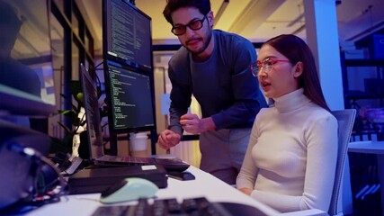 Asian software engineer or programmer team working late in development office,problem solving or algorithm of ai assistant helping for work.software developer,digital technology security concept