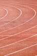 © Austockphoto - Athletics track lanes.