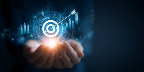 Wall Mural - hands hold glowing target with arrow, symbolizing achievement, success, and goal attainment in busin