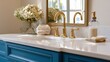 © Smoky - Bathroom vanity detail, gold faucet, marble countertop, blue cabinet, flowers in vase, interior design, home improvement, modern style, luxury