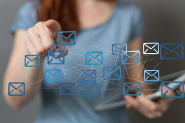 Aufkleber - Image depicts a woman interacting with a digital network of email icons, representing email management and communication.