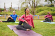 © Sabrina - Group of multi generational women doing yoga exercise at park - Diverse people, healthy lifestyle and community concept