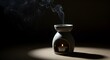 © Masaji - Ceramic aroma lamp with a burning candle and rising smoke on a dark background scene