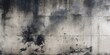 © Haseeb - Dark smoke stains and burn marks on a concrete wall surface with gritty urban texture