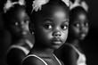 © Serhii - Three Cute Young African Ballet Dancers in Serious Classmates Pose - Capturing Graceful Movements of Black Children in Ballet