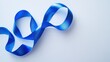 © Andrii - Blue ribbon elegantly twisted on white background