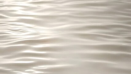 Fototapete - 滑らかな光と影が反射する穏やかな水面 水の背景の抽象的なクローズアップ 波紋 動きとテクスチャが特徴
