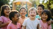 © NN AI - Diverse group of children laughing together outdoors in sunlight. Kids with Down syndrome and different ethnicities enjoying playground. Inclusion concept. Friendship without boundaries. Childhood joy