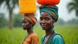 © Vadym - African women carry water buckets on heads. Traditional attire, rural lifestyle, focus on person in front, smiling in portrait. AI generated image with grass background.