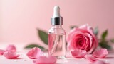 Rose water bottle with rose petals on pink. Rose essential oil serum spa treatment. Beauty product for cosmetic, aromatherapy, skincare, facial massage, self-care. Perfect for feminine beauty,