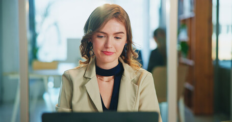 Leinwandbilder - Laptop, reading and business woman in office to check email, revenue and investment banking on website. Computer, happy worker and online for financial news, economy update or review on internet