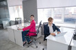 © Михаил Решетников - Caucasian young woman spying on colleague.
