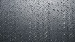 © benjamas - Close-Up View of Chevron Patterned Metal Surface with Reflective Gray Texture