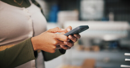 Leinwandbilder - Hands, phone and typing with person in factory for manufacturing or production process closeup. App, communication and text message with plant or warehouse employee at work for quality control