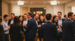 © CamTu - Blurred Group of Professionals Networking at Event