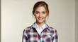 © Creativa - Smiling woman in plaid shirt portrait
