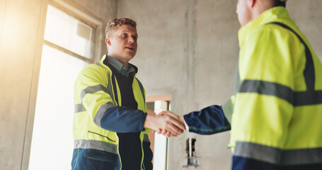Poster - Man, construction worker and handshake for agreement, renovation and low angle for deal at site. People, engineer and architect with greeting, respect and shaking hands for introduction at property
