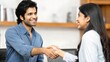 © Jo - Happy Indian Employer Congratulating New Male Employee After Interview
