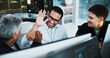 © peopleimages.com - Web developer, high five and celebration in office for software, system or website update launch. Night, happy programmer and backend engineer for company development, teamwork or project on computer