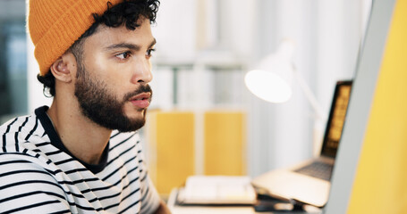 Fototapete - Reading, computer and planning with business man in office for graphic designer, digital media project and research. Website branding, content review and report with person in startup for publication