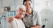 © peopleimages.com - Senior woman, physiotherapist and hug in portrait at clinic with smile, recovery or medical services. People, elderly patient and embrace for wellness, happy or support in rehabilitation at hospital