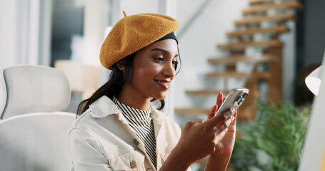 Aufkleber - Business woman, smile and typing with phone in office for browser testing, client feedback and networking. Web designer, employee and smartphone for app troubleshooting and update at creative agency