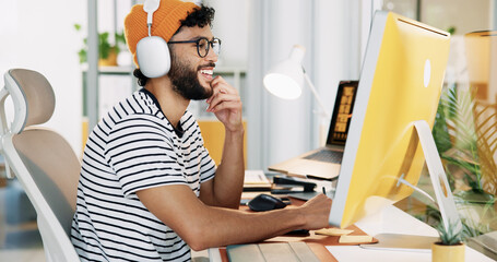 Leinwandbilder - Creative, web designer and man on computer in office for software, website update or user interface. Happy, professional and person on pc listen to music for online project, graph design and internet
