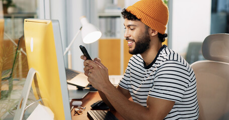 Aufkleber - Computer, web designer and man with phone in office for software, website update and user interface. Happy, digital agency and person on smartphone for social media, internet and message on break