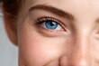 © Moiseieva  - Close up portrait of beautiful young woman with blue eyes looking at camera