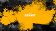 © kanpisut - Yellow and black abstract grunge background with brushstroke textures