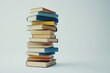© Rayyanza - Tall Stack of Colorful Books on White Background