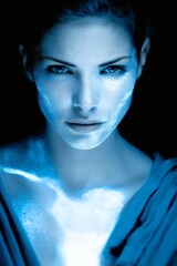Wall Mural - woman glowing with blue light particles, futuristic female portrait with ethereal energy, concept fo